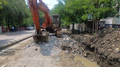 NMC: Busy Nagpur streets under construction, symbolizing traffic congestion and infrastructure works.