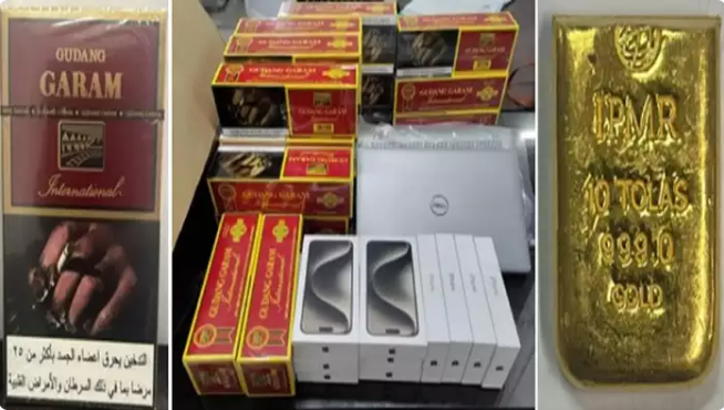 Customs officials seizing gold, gadgets, and banned cigarettes at Nagpur Airport.