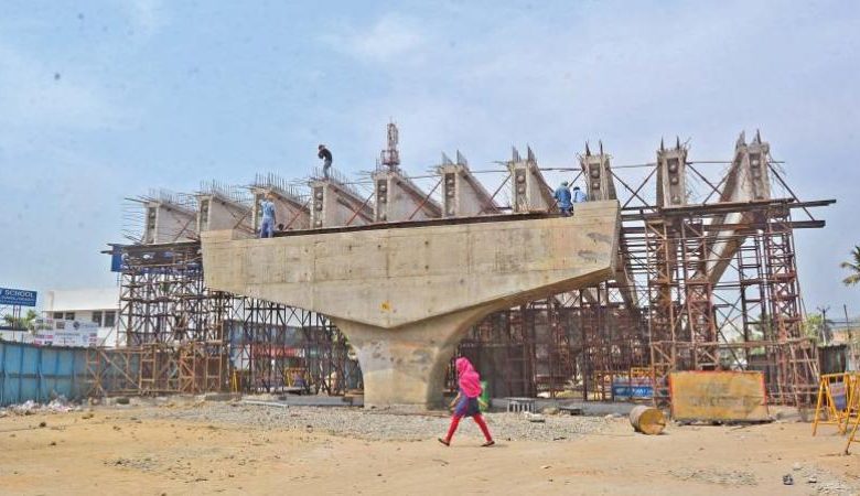 Construction site of the Wadi T Point flyover facing delays with ongoing work.