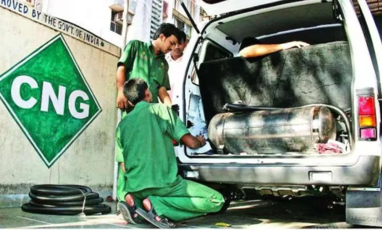 A CNG filling station in Nagpur with a focus on new, reduced prices displayed prominently. CNG price cut. eco-friendly fuel Nagpur