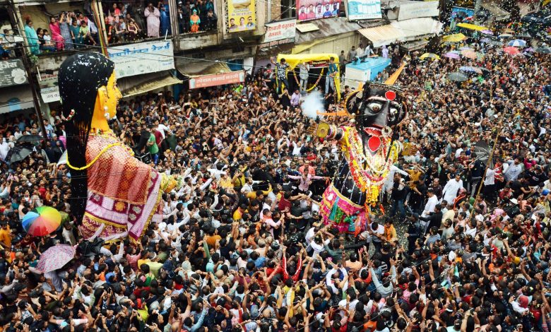 A vibrant parade of Marbat effigies in Nagpur, symbolizing the city's fight against societal ills.