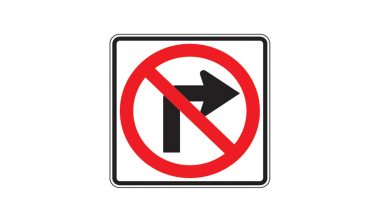 Morris College: Traffic sign at Ajni Square showing no right turn during peak hours, with vehicles moving smoothly under new rules.