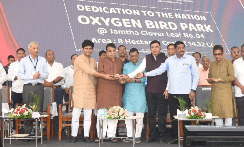 Mukesh Ambani launching a rice straw-based CNG project amidst green surroundings.