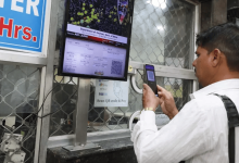 QR code payment system at railway ticket counters for fast and secure ticket purchases.