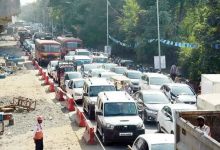 Traffic congestion and illegal parking on busy roads in Nagpur, contributing to gridlock and blocking emergency services.