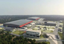 Aerial view of a logistics park in Nagpur, highlighting warehouses and transportation networks.