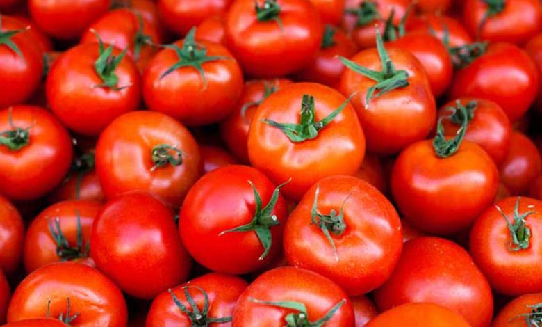 Tomatoes affected by unseasonal rains and virus attack, leading to a significant price hike in Nashik markets.