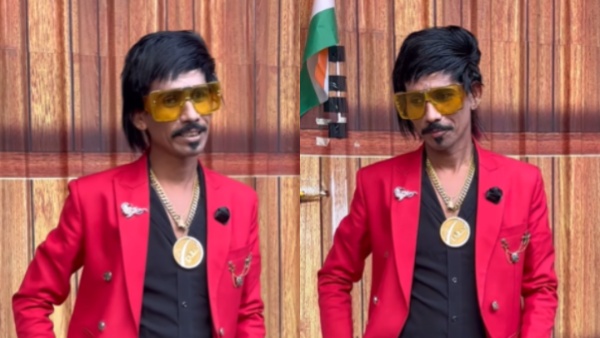 Dolly Chaiwala posing confidently in a red blazer, preparing for his Bigg Boss 18 appearance.