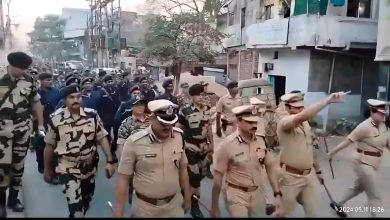 Nagpur Police Commissioner Dr. Ravindra Singhal leading a foot march in Mominpura post-CAA implementation.