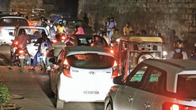 A chaotic cityscape with traffic congestion, emblematic of Dhantoli's parking and traffic issues in its medical hub.