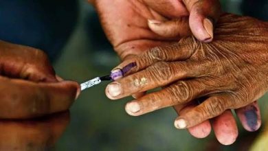 Elderly person casting their vote from home, promoting inclusive democracy.