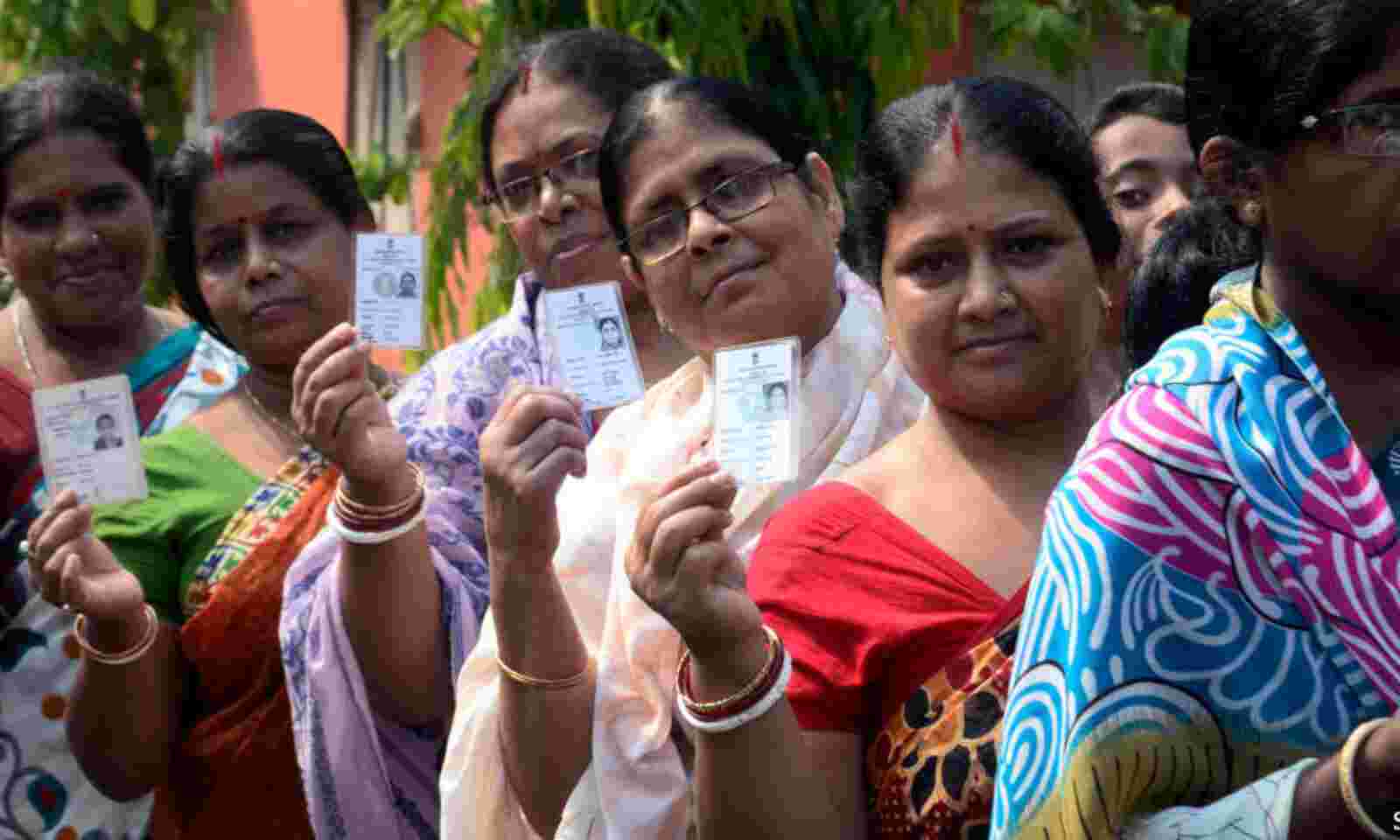 Women voters casting their ballots, symbolizing empowerment and democratic participation. | Women Voters Maharashtra Lok Sabha Elections