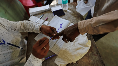 diverse group of people participating in a voting awareness event at Kasturchand Park in Nagpur.