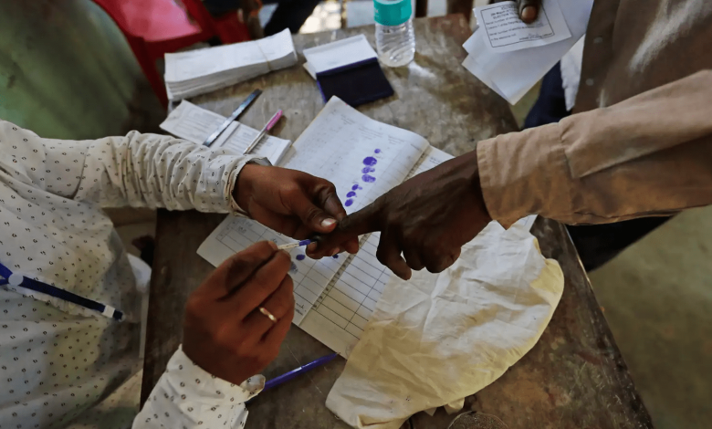 diverse group of people participating in a voting awareness event at Kasturchand Park in Nagpur.