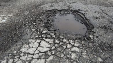 A dangerous pothole on Kalamna Road, Nagpur, posing a threat to motorists.