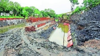 Reconstruction of Ambazari Bridge in progress amid delays and heavy rainfall.