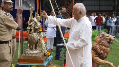 RSS Chief Mohan Bhagwat hoisting the national flag at the RSS Headquarters on Independence Day, symbolizing unity and national pride.