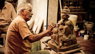 Eco-friendly Ganesh idol immersion in artificial ponds promoting environmental sustainability.