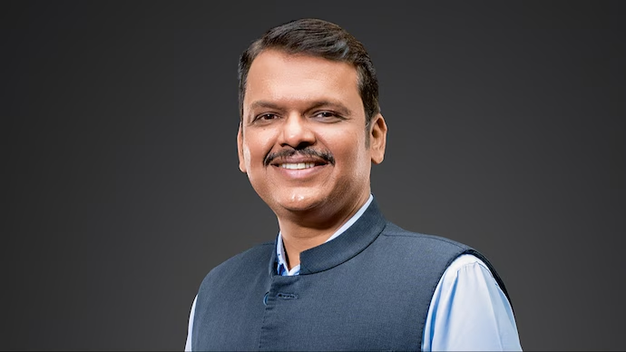 Maharashtra Deputy CM Fadnavis addresses Coldplay ticketing issue at CNN-News18 Town Hall amidst controversy.