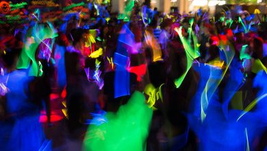 MIDC Police Station , Nagpur: A bustling dance bar scene with pink disco lights and officers raiding.