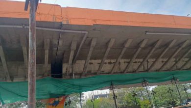 Nagpur: Damaged Butibori flyover section under inspection with visible cracks and exposed iron bars.