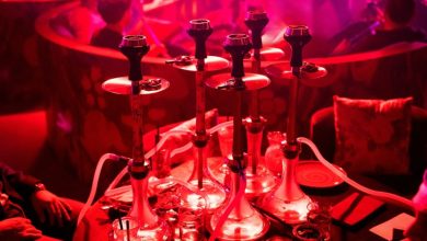 Police raid uncovering illegal hookah operations at Fusion Cafe in Dharampeth, Nagpur.