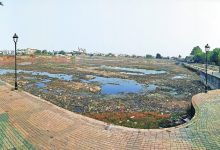 Dry Sakkardara Lake during rejuvenation work showcasing desilting efforts.