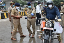 Traffic police in Nagpur managing city traffic and issuing challans.