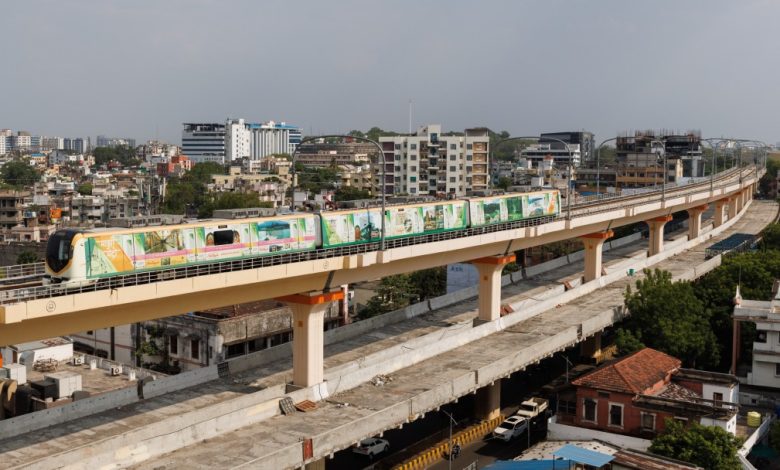 Nagpur Metro train arriving at the Airport Metro Station, symbolizing enhanced connectivity.