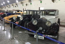 A lineup of beautifully restored vintage cars and bikes at an exhibition. Raman Science Centre | Vintage Car and Bike Display