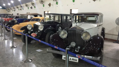 A lineup of beautifully restored vintage cars and bikes at an exhibition. Raman Science Centre | Vintage Car and Bike Display