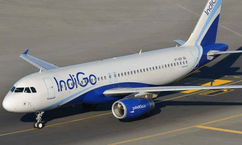 IndiGo aircraft at the airport, representing the new direct flight route between Pune and Prayagraj.