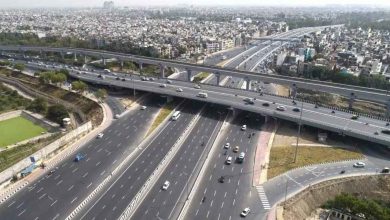 A busy road beneath the Butibori flyover undergoing repairs.