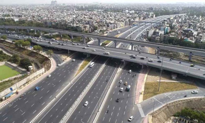 A busy road beneath the Butibori flyover undergoing repairs.