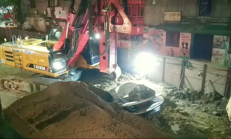 Nagpur flyover construction site showing traffic congestion and flyover pillars under construction